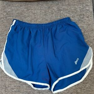 Asics Blue Athletic Shorts with Elastic Waistband and Curved Hem
